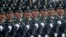 Soldiers of People's Liberation Army march in formation past Tiananmen Square during the military parade marking the 70th founding anniversary of People's Republic of China, on its National Day in Beijing, Oct. 1, 2019.