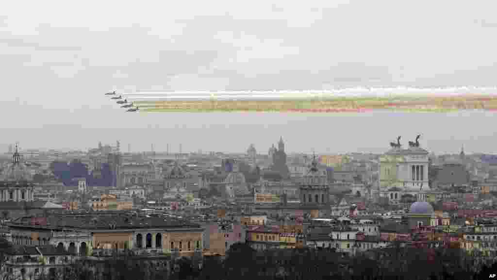 The &#39;Frecce Tricolori&#39;, the Italian Air Force acrobatic team flies over Rome to mark the 154th anniversary of the Italian Unification in 1861.