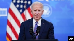 President Joe Biden speaks during an event to mark Equal Pay Day in the South Court Auditorium in the Eisenhower Executive Office Building on the White House Campus, March 24, 2021, in Washington.