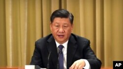 Presiden China Xi Jinping memberikan sambutan dalam peringatan 40 tahun "Pesan kepada Teman-Teman sebangsa di Taiwan" di Aula Besar Rakyat di Beijing, Rabu, 2 Januari 2019.