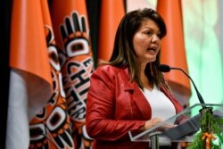FILE - Tk'emlups te Secwepemc Chief Rosanne Casimir speaks ahead of the release of findings on 215 unmarked graves discovered at Kamloops Indian Residential School in Kamloops, British Columbia, Canada, July 15, 2021.