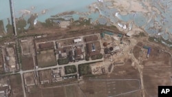 FILE - Satellite image provided by GeoEye shows the area around the Yongbyon nuclear facility in Yongbyon, North Korea. The U.S.-Korea Institute at Johns Hopkins School of Advanced International Studies said shows that North Korea has resumed building wor
