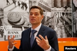 FILE - Russian steel magnate Alexei Mordashov speaks during an interview at the St. Petersburg International Economic Forum, in St. Petersburg, Russia, May 25, 2018.