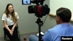 In this demonstration, U.S.-based SilverLogic Labs conducts a test with technology it is developing that it says can be used as a high-tech lie detector tool. (Reuters) 