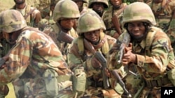 U.S.-led training of forces across Africa such as here in post-conflict Liberia is drawing new scrutiny (file photo)