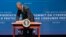 President Barack Obama signs an executive order promoting private-sector cybersecurity information sharing during a summit on cybersecurity and consumer protection in Palo Alto, California, Feb. 13, 2015.