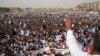 FILE - Members of Pakistan's Pashtun community listen to their leader during a rally in Karachi against what they said were human rights violations, May 13, 2018. The rally was organized by the Pashtun Tahaffuz Movement. 