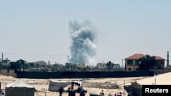 Dim se diže nakon izraelskih udara tokom izraelske vojne operacije, usred tekućeg sukoba između Izraela i Hamasa, u Rafahu, južni pojas Gaze, 3. juna 2024.