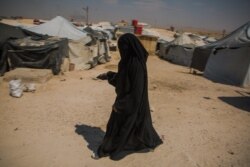This camp houses more than 70,000 people, mostly relatives of IS fighters who fled the final IS stronghold as the militant group lost its territory this year, pictured on Aug. 26, 2019 in al-Hol Camp, Syria. (VOA/Yan Boechat)