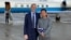 FILE - In this image released by the US State Department US Special Representative for Iran Brian Hook welcomes Princeton graduate student Xiyue Wang on arrival in Switzerland after his release from Iran on Dec. 7, 2019. (Ho/US State Department/AFP)