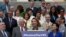 House Minority Leader Nancy Pelosi of Calif., center, accompanied by fellow Democrats, speaks on the House East Front Steps of the Capitol in Washington, July 30, 2015, to commemorate the 50th anniversary of the Voting Rights Act.