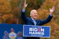 Democratic presidential candidate former Vice President Joe Biden speaks at a drive-in campaign stop at Bucks County Community College in Bristol, Pa., Saturday, Oct. 24, 2020.