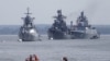 Russian war ships are seen anchored in a bay of the Russian fleet base in Baltiysk in Russia's Kaliningrad region between Poland and the Baltic states, July 19, 2015.