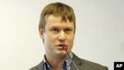 This undated photo shows Leonid Razvozzhayev speaking in an undisclosed location and is provided by the Associated Press Television News, October 22, 2012. 