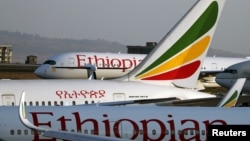 FILE - Ethiopian Airlines planes are seen in on the tarmac at the Bole International Airport in Addis Ababa, Ethiopia, April 7, 2020. 