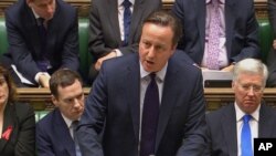 FILE - British Prime Minister David Cameron, shown speaking in the House of Commons in London in December, wants to ensure that any country not in the European Union does not face discrimination from member states. 
