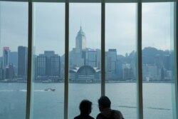 Visitors sit inside Hong Kong Museum of Art, as the coronavirus disease (COVID-19) outbreak continues, in Hong Kong, China, Nov. 10, 2020.