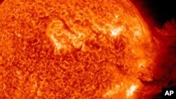 FILE - The Sun unleashed an M-2 (medium-sized) solar flare, an S1-class (minor) radiation storm and a spectacular coronal mass ejection (CME) on June 7. 