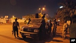 Malian troops on alert near the European Union military mission in Bamako, Mali, March 21, 2016.