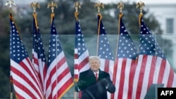 US President Donald Trump speaks to supporters from The Ellipse near the White House on January 6, 2021, in Washington, DC. - Thousands of Trump supporters, fueled by his spurious claims of voter fraud, are flooding the nation's capital protesting the exp