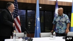 U.S. Secretary of State Mike Pompeo (L) and Micronesia's President David Panuelo are seen at their joint news conference after their meetings in Kolonia, August 5, 2019.