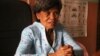 Svay Simorn, who is a widow and a social worker, tells VOA Khmer that she has been discriminated for more than 30 years for having a mentally disabled daughter and grandson. (Oum Sonita/VOA Khmer)