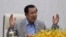 FILE: Cambodia's Prime Minister Hun Sen gestures during a speech on the current state of a new virus from China in Phnom Penh, Cambodia, Thursday, Jan. 30, 2020. (AP Photo/Heng Sinith)