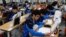 FILE - Students retaking college entrance exams attend class at Deung Yong Moon Boarding School in Kwangju, 40 kilometers (25 miles) southeast of Seoul, Oct. 30, 2012. Operators of the ACT college entrance exam on Saturday canceled the test for all of Sou