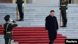 រូបឯកសារ៖ ប្រធានាធិបតីចិនលោក Xi Jinping មកដល់វិមានរដ្ឋាភិបាល ក្នុងក្រុងប៉េកាំង ​ប្រទេសចិន កាលពីថ្ងៃទី២៥ ខែតុលា ឆ្នាំ២០១៩។ 