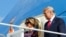Odlazeći američki predsjednik Donald Trump i američka prva dama Melania Trump stižu na Floridu, 20. januara 2021. 