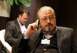 FILE - The late Saudi journalist Jamal Khashoggi, a Saudi critic and a Washington Post columnist, is pictured at the World Economic Forum in Davos, Switzerland, Jan. 29, 2011.