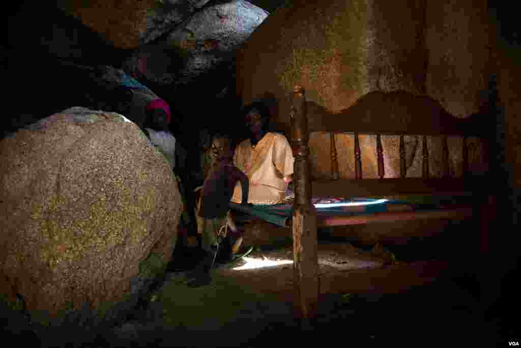 Many families now live permanently in caves too escape relentless relentless aerial bombardment by Sudan’s armed forces. (Adam Bailes/VOA News)
