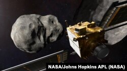Artist illustration of DART approaching its target at the Didymos binary asteroid system