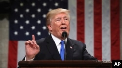President Donald Trump delivers his first State of the Union address in the House chamber of the U.S. Capitol to a joint session of Congress, Jan. 30, 2018 in Washington.
