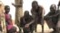 Residents of Lankien, an isolated community in South Sudan, gather for a communal meal. See related video by VOA's Gabe Joselow.