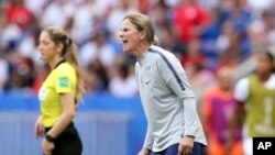 United States coach Jill Ellis shouts instructions during the Women's World Cup final soccer match between US and The Netherlands at the Stade de Lyon in Decines, outside Lyon, France, July 7, 2019.