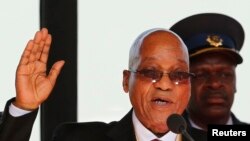 South African President Jacob Zuma takes his oath of office during his inauguration ceremony at the Union Buildings in Pretoria May 24, 2014.