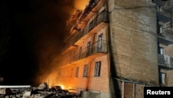 អគារ​នេះឆេះ​ដោយសារ​ការ​វាយប្រហារ​ដោយ​ដ្រូន​ ក្នុង​អំឡុងពេល​នៃ​ការវាយប្រហារ​របស់​រុស្ស៊ី​លើ​អ៊ុយក្រែន ក្នុង​ក្រុង Rzhyshchiv តំបន់​កៀវ ប្រទេស​អ៊ុយក្រែន ថ្ងៃទី២២ ខែមីនា ឆ្នាំ២០២៣។