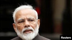 India's Prime Minister Narendra Modi speaks with the media on the opening day of the parliament session in New Delhi, India, June 17, 2019. 