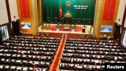 FILE - Prime Minister Nguyen Tan Dung at opening ceremony of the autumn session of Vietnam's National Assembly, Hanoi, Oct. 21, 2013.