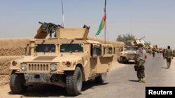 Pasukan Afghanistan tiba di distrik Nad Ali di provinsi Helmand, Afghanistan, 10 Agustus lalu (foto: dok). 