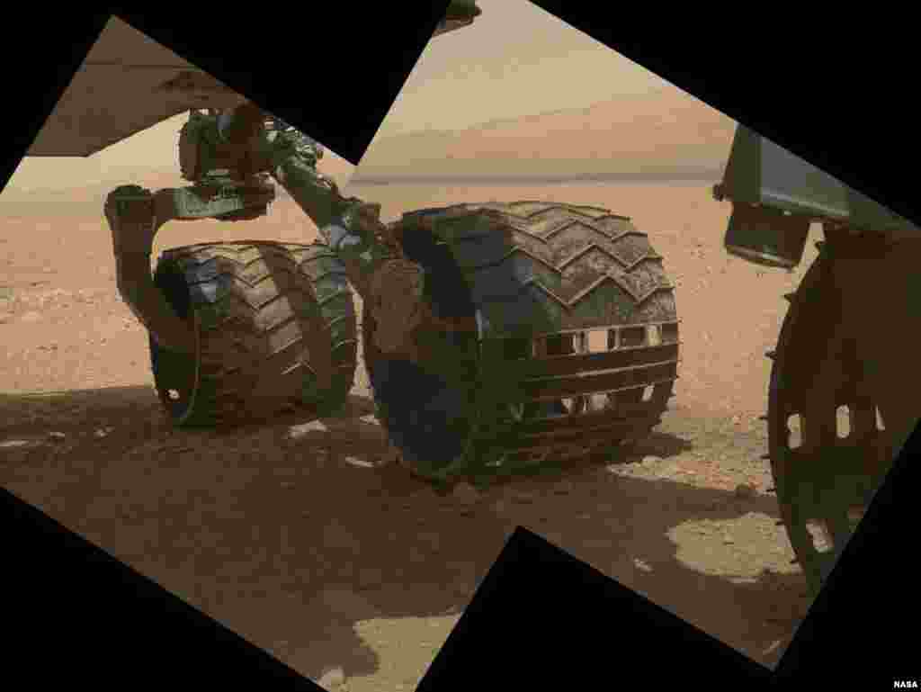 This view of three of Curiosity's wheels combines two images taken on September 9, 2012. 