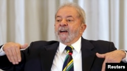FILE - Former Brazilian President Luiz Inacio Lula da Silva reacts as he speaks during a news conference with international media in Sao Paulo, Brazil, March 28, 2016. 
