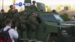 VOA60 America- Search for motive after gunmen kill at least 14 people in San Bernardino, CA