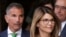 FILE - Actress Lori Loughlin, front, and husband, clothing designer Mossimo Giannulli, left, depart federal court in Boston after facing charges in a nationwide college admissions bribery scandal, Apr. 3, 2019.
