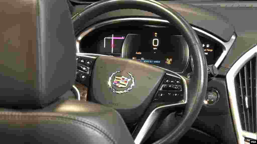 The sleek dash of a new Cadillac incorporating new technologies