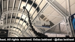 Holiday travelers walk through the terminal at O'Hare International Airport in Chicago. (Photo: Diaa Bekheet). Airports around the United States are expected to be very busy as record number of holiday travelers is expected this year.