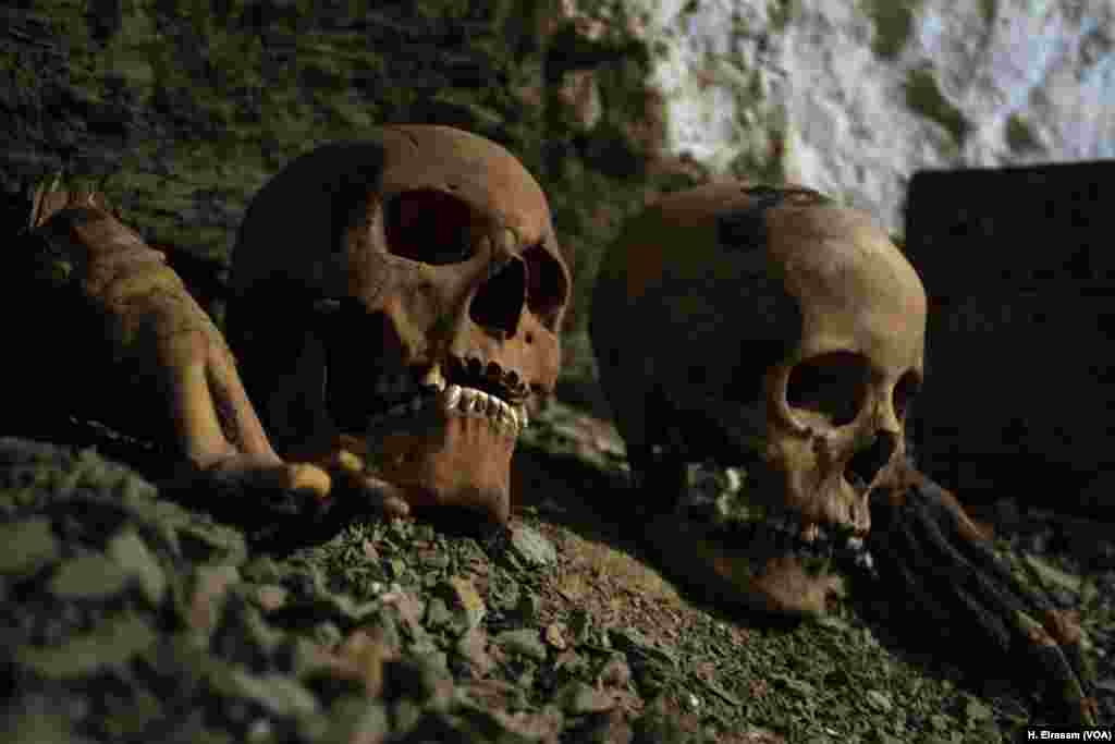 Two skulls and foot bones were found in the (KAMPP 390) tomb, in Luxor, Egypt, Sept. 9, 2017.