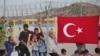 Turkey Calls on World Leaders to Share Burden of Migrant Crisis