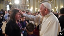 Pope Francis arrives in the Cathedral for a prayer on relics of Peru Saints in Lima, Peru, Jan. 21, 2018. 